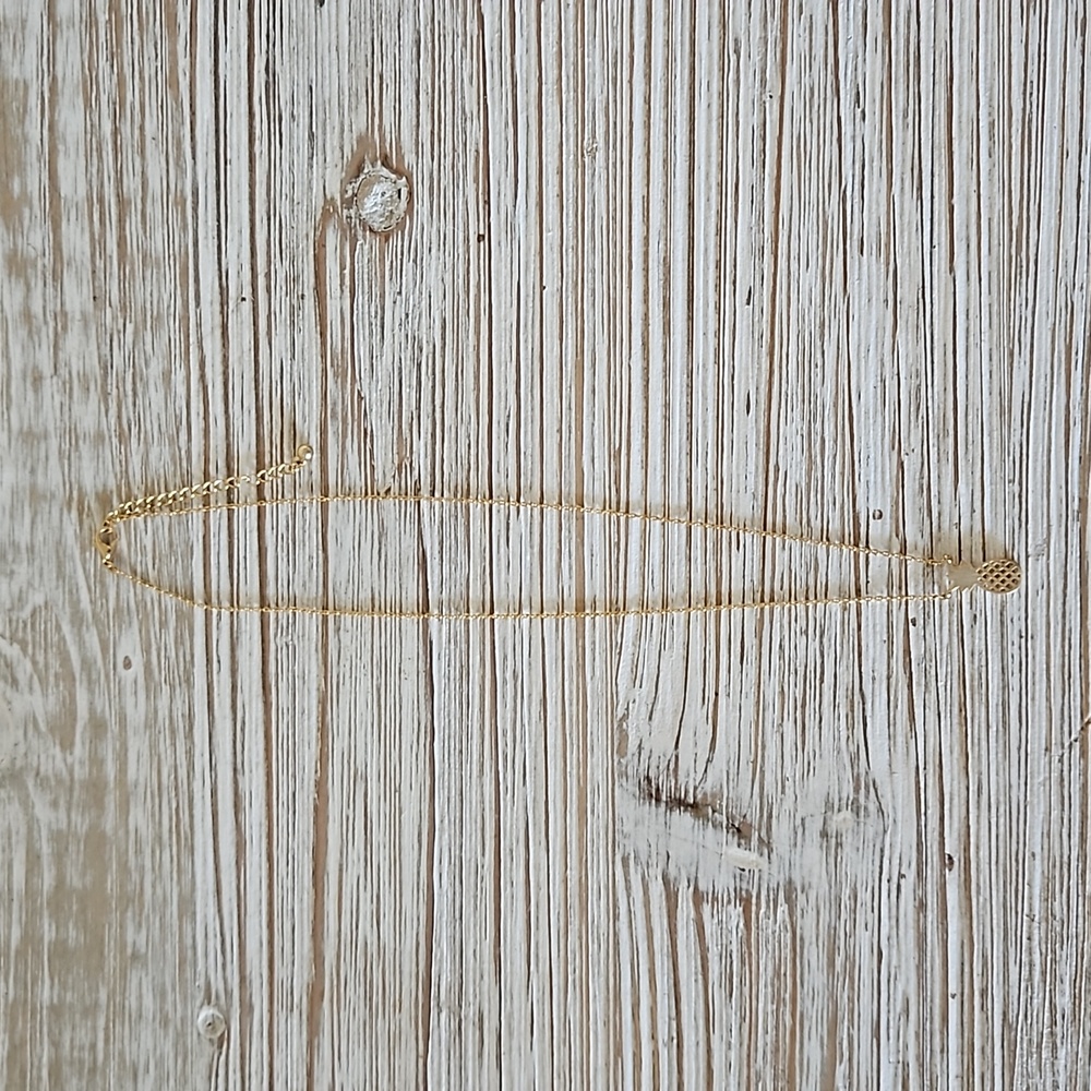 Gold pineapple necklace, $5